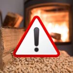 Stufa a pellet e simbolo attenzione